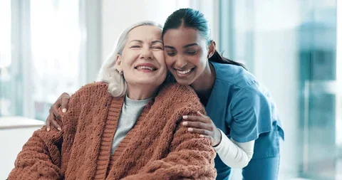 Stock image: a caregiver and an older adult sharing a warm moment