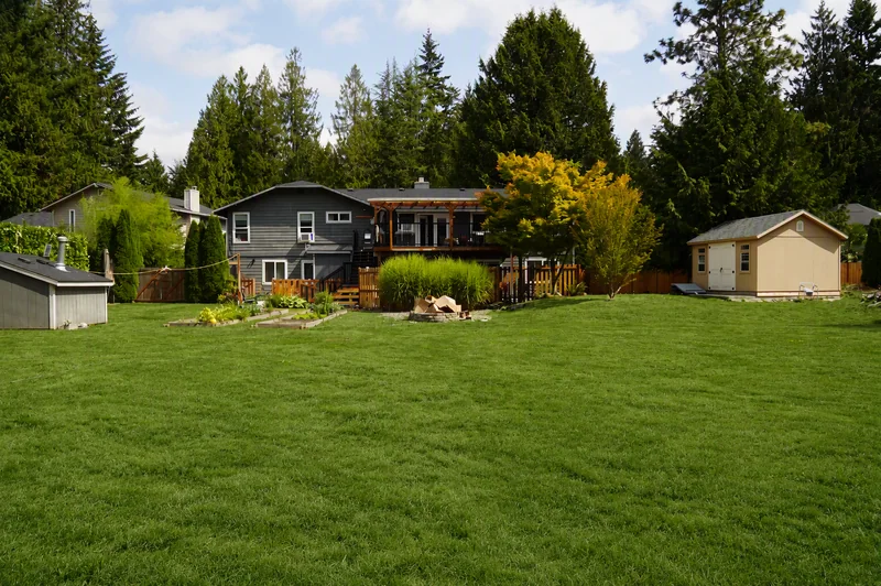 The back garden and lawn beside the home