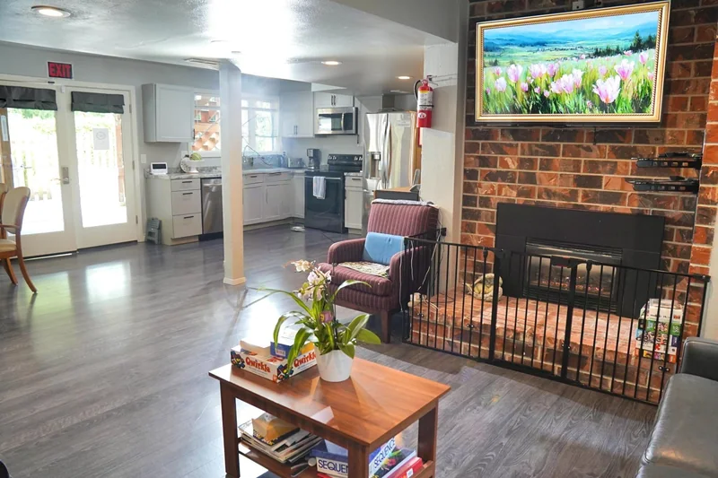 The kitchen seen from the living room fireplace
