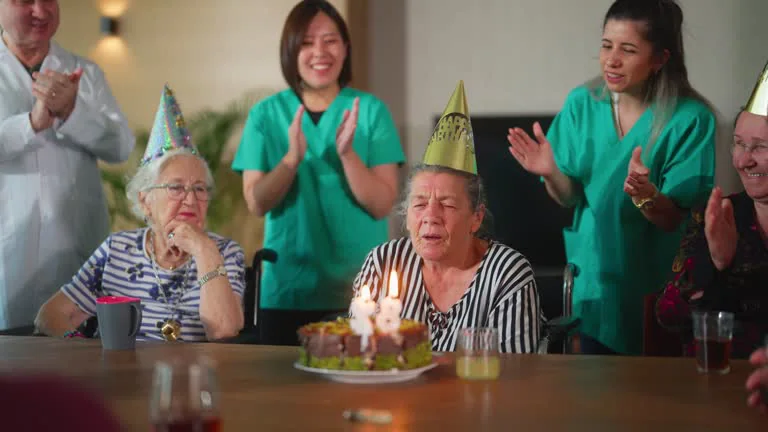 Stock image: a birthday celebration around a table