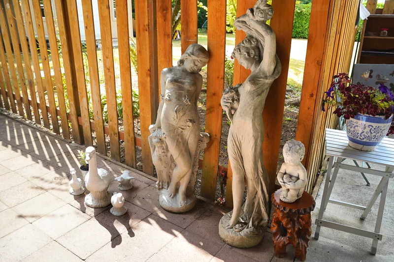 Garden ornaments along the patio railing