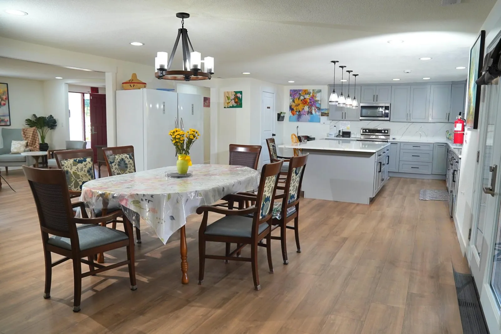 Dining area with a table and chairs open to the kitchen